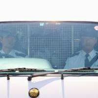 A van carrying Vayron Jonathan Nakada Ludena arrives at a police station in Kumagaya, Saitama, in May 2016. KYODO Man indicted in Saitama slayings of six has mental illness, defense-initiated psychiatric test concludes