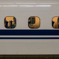 A shinkansen is seen in this undated image. On Sunday, a shinkansen passenger’s tablet computer apparently caught fire, forcing an emergency halt to the train. Bullet train stops after tablet PC catches fire, singes table