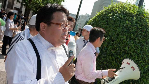 Hate on the mic: Makoto Sakurai, then the leader of the anti-Korean rightist group Zaitokukai, speaks outside Yasukuni Shrine in Tokyo on Aug. 15, 2009. Running as a candidate in Tokyo’s gubernatorial election last year, he pledged to pass legislation banning “harassment of Japanese based on fabricated history,” which he called “anti-Japanese hate speech. “ Japan doesn't need to criminalize hate speech