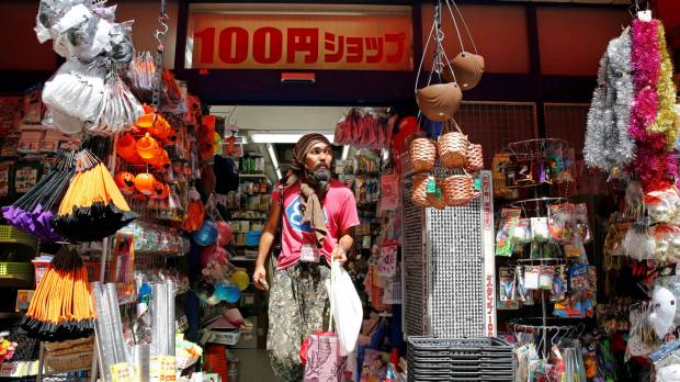 New hope: Tokuchika Nishi, a 38-year-old homeless man who says joining the dance group Newcomer “H” Sokerissa!, changed his life, steps out of a ¥100 shop in Tokyo. Dancing to the tune of humanity