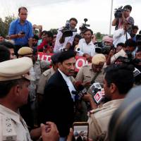 S. K. Garg Narwana, lawyer of Gurmeet Ram Rahim Singh, a “godman,” speaks with the media on Aug. 28 after his client was convicted of rape charges in Rohtak, Haryana state. The harsh truth about India's 'godmen'
