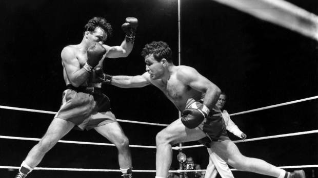 Jake LaMotta (right) fights France’s Marcel Cerdan at Briggs Stadium in Detroit in June 1949. 'Raging Bull' inspiration LaMotta dies at 95