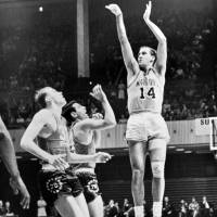 San Francisco Warriors star Tom Meschery, who lived in a Tokyo-area internment camp during World War II, takes a shot against the Philadelphia 76ers during the 1960s. Eclectic Meschery has lived rich life in NBA, literature