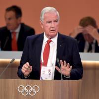 World Anti-Doping Agency chief Craig Reedie delivers his report on doping at the IOC Session in Lima on Friday. Russia doping issue persists