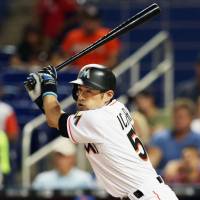 Ichiro Suzuki hits a single against the Mets to begin the bottom of the fifth inning on Monday in Miami. Ichiro finished with two hits in the Marlins’ 13-1 victory. Marlins light up Mets in rout