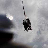 Workers from Montana-based Whitefish Energy Holdings help fix Puerto Rico’s power grid, damaged during Hurricane Maria in September, in Manati, Puerto Rico, Oct. 25. FBI probing Puerto Rico power contract awarded to Montana start-up without bidding: WSJ