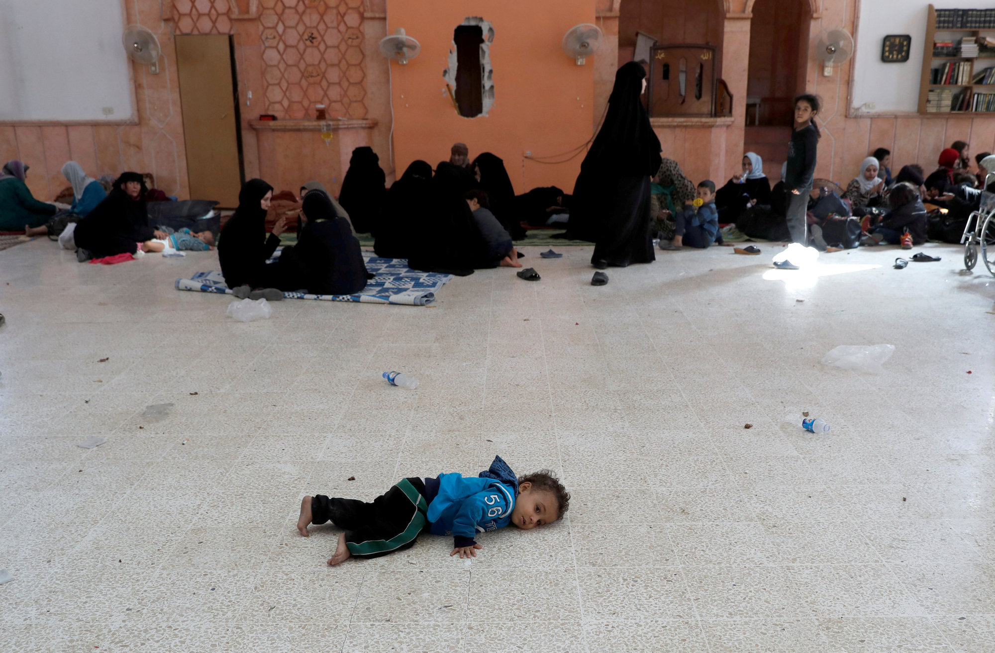 U.S. coalition airstrikes seen taking heavy civilian toll as families flee Raqqa, Islamic State holdouts