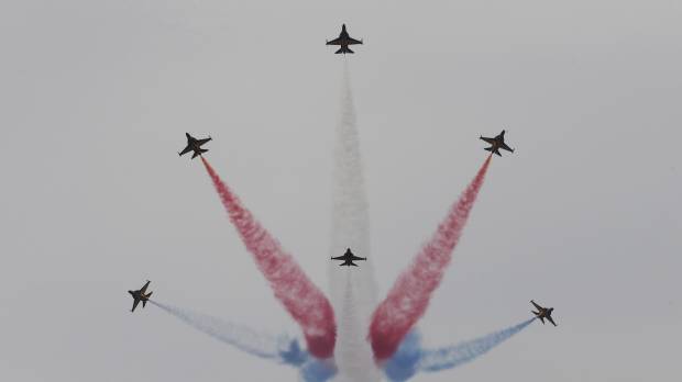 The South Korean Air Force’s Black Eagles aerobatic team performs during the press day of the 2017 Seoul International Aerospace and Defense Exhibition at Seoul Airport in Seongnam, South Korea, on Monday. South Korean and U.S. troops launched five days of naval drills on Monday, three days after North Korea renewed its threat to fire missiles near the American territory of Guam. Diplomacy with North Korea will continue 'until the first bomb drops,' Tillerson says