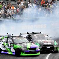 Drivers compete in the FIA Intercontinental Drifting Cup in Tokyo’s Odaiba district on Sunday. Drifting: Japan-born street sport roars onto global stage