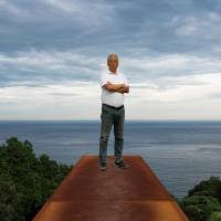 Home by the sea: Artist Hiroshi Sugimoto stands atop a 70-meter rectangular chamber made from CorTen weathering steel that starts underground and ends up as a sheer drop overlooking the ocean at the Enoura Observatory, Kanagawa Prefecture. It is angled to capture the winter solstice. Hiroshi Sugimoto: The illusion of architecture