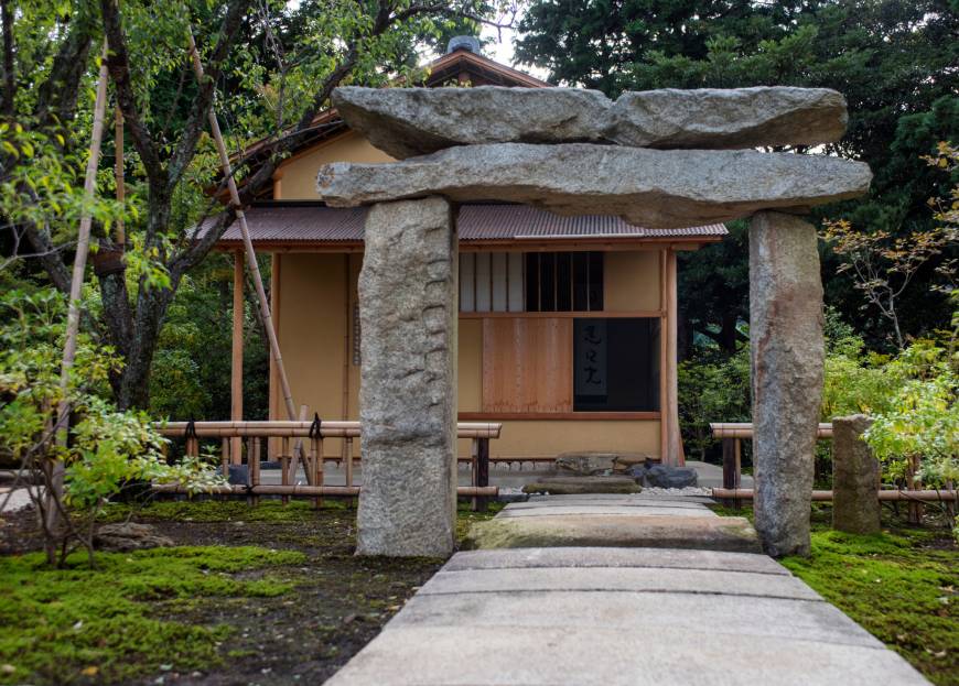 A stone torii gate stands at the entrance to a teahouse at the Enoura Observatory in Kanagawa Prefecture.