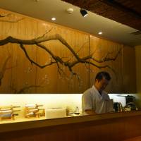 Taste of Hyogo: Chef Tsutomu Nakajima works his culinary magic under his evergreen cherry tree at Sato no Ie Hanase. Sato no Ie Hanase