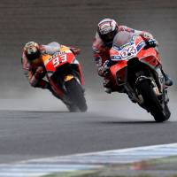 Ducati’s Andrea Dovizioso leads Honda’s Marc Marquez during the MotoGP Japanese Grand Prix on Sunday in Motegi, Tochigi Pref. Dovizioso beats Marquez in MotoGP thriller at Motegi