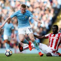 Manchester City’s Kevin De Bruyne (left), seen in action with Stoke City’s Mame Biram Diouf, is a vital part of the team’s midfield. Man City's De Bruyne in a league of his own
