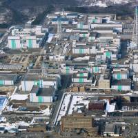 A spent nuclear fuel reprocessing plant in Aomori Prefecture is seen in this aerial photo taken in March 2014. KYODO Cesium traces found at Aomori nuke site believed from 2010 container leak