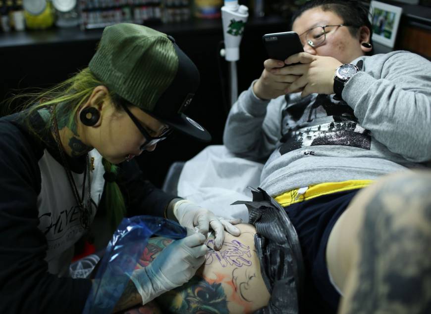 Covered In Ink Chinese Women Peel Away Tattoo S Social Stigma The Japan Times
