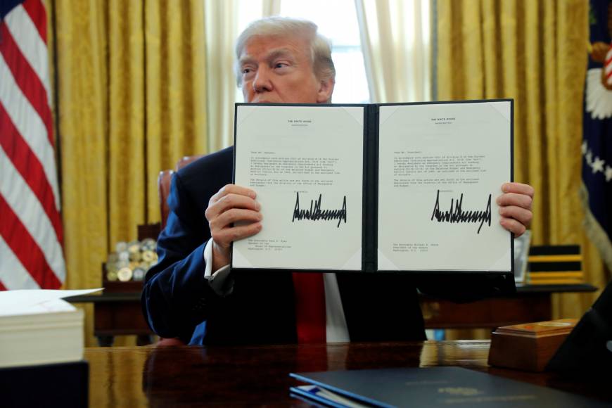 Trump Signs Tax Cut Into Law At Rush Job Oval Office Event The Japan Times