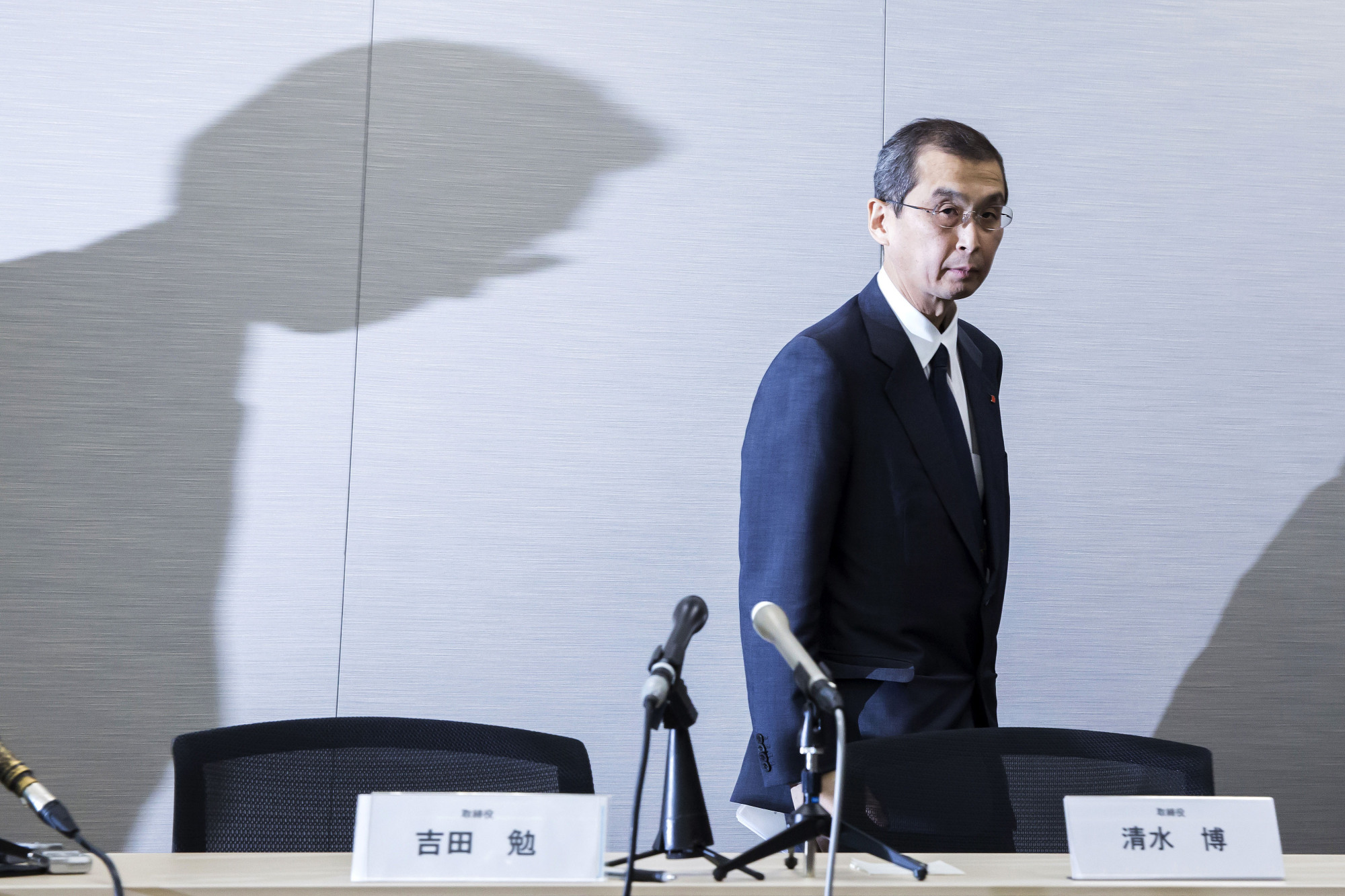 An unfortunate turn of events: Shigehisa Takada, chairman and CEO of Takata Corp., leaves a news conference in June.