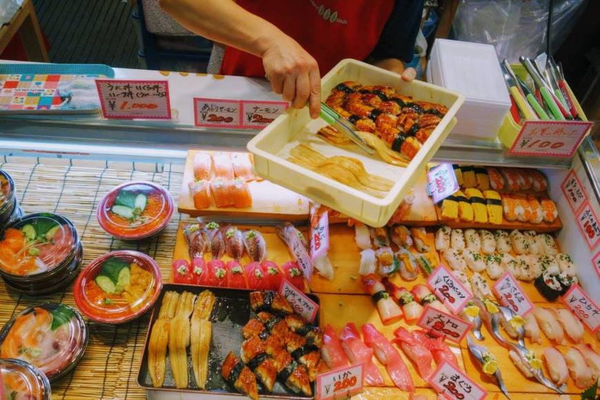 Fresh fish: A vendor restocks a display of sushi at Karato Market in Shimonoseki, Yamaguchi Prefecture.