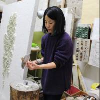 Finding solace: Mosaic artist Takako Hirai works in her studio in Ravenna, Italy. Solitary mosaic artist Takako Hirai chips away at expression