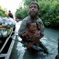 Rohingya refugees arrive on the Bangladeshi side of the NafRiver after crossing from Myanmar on Oct. 16. Over 600,000 Rohinyga have fled to Bangladesh this year following rapes, murders and the burning of their villages. The best and worst of Asia in 2017