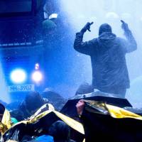 Police use water cannons to drive back demonstrators protesting against the Alternative for Germany far-right party in Hannover, northern Germany, last Saturday. Accepting Europe's anti-immigration parties