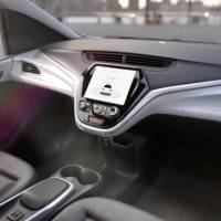 GM’s planned Cruise AV driverless car, which features no steering wheel or pedals, is seen in a still image taken from video released Friday. GM applies to deploy self-driving Cruise AV robo-taxi next year