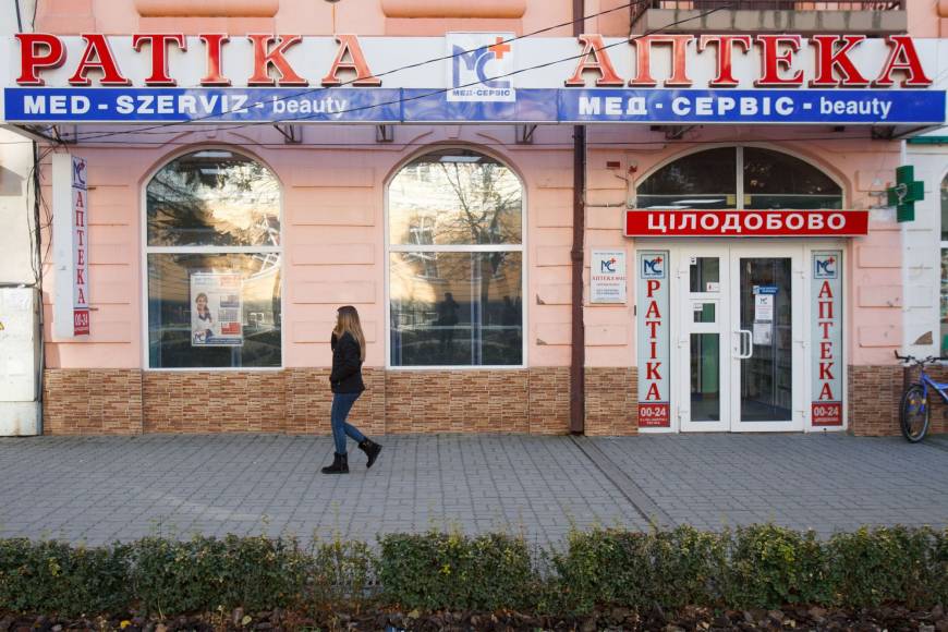 A pharmacy in Beregove, Ukraine, is seen here with signs in both Ukrainian and Hungarian on Nov. 14. Ukraine language reform fuels identity fears among ethnic Hungarians