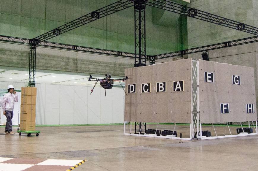 A drone fitted with stereo fisheye lens navigates the inside of a building during tests.