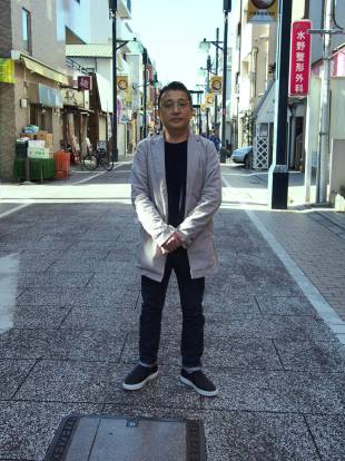 Tetsuro Kamei, owner of Gallery Kamei, recalls being raised by the community in Tokyo