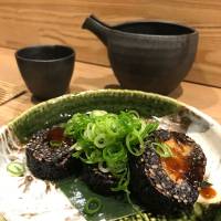 Rice is king: Yam paste wrapped in sticky black rice at Komesan. Komesan