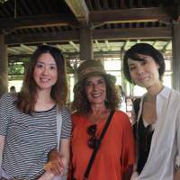 Cross-cultural experiences: Yumiko Oho (left), whose online businesses are based in Tuscany, shows Italian travelers around Japan. Yumiko Oho teaches the ABC's of life in Italy