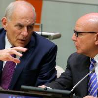 U.S. White House Chief of Staff John Kelly (left) confers with National Security Adviser H.R. McMaster during a panel discussion at the United Nations on Sept. 18. Warning: Trump's baby sitters are about to head home