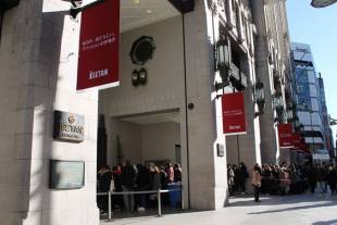 Hundreds of shoppers wait in line for the Isetan Shinjuku January sales to begin.