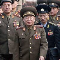 North Korea’s chief delegate Kim Yong Chol (center) and North Korean soldiers cross the border dividing the two Koreas to attend the inter-Korean general talks at the South’s side of the truce village of Panmunjom, in the Demilitarized Zone, in December 2007. South Korean lawmakers demand execution of North's Olympic delegate