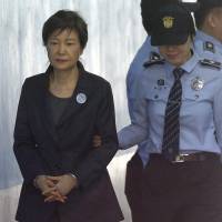 Ousted South Korean ex-President Park Geun-hye arrives to attend a hearing on the extension of her detention at the Seoul Central District Court in the South Korean capital in October. South Korean prosecutors demand 30 years for ousted ex-President Park Geun-hye