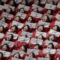 North Korean supporters hold up Korean unification flags during the ladies’ 500 meters short-track speedskating event during the 2018 Winter Olympics in Gangneung, South Korea, on Saturday. Hackers hit Winter Olympics in apparent attempt to embarrass organizers