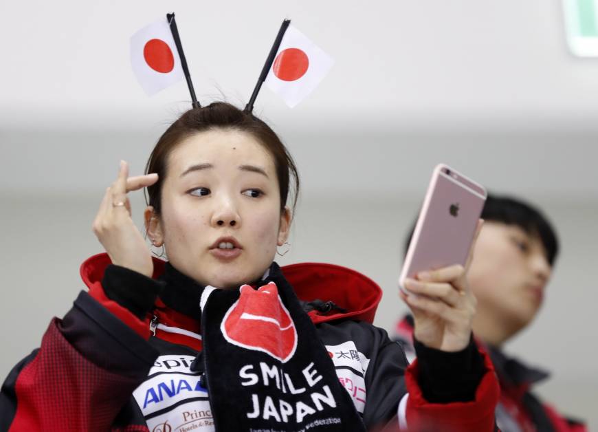 A fan takes a selfie before the Sweden v Japan women
