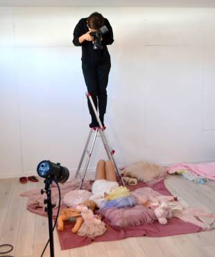 Kiina Matsunaga poses for a photo to add to her portfolio (an example of which can be seen right) at Moffy Photo Studio in Osaka.