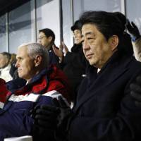 Prime Minister Shinzo Abe watches the Feb. 9 opening ceremony of the 2018 Winter Olympics in Pyeongchang, South Korea, alongside U.S. Vice President Mike Pence and his wife, Karen. Japan asks wrong question about Olympic Games
