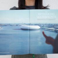 Fake news: The time capsule from the future that turned up at Florian Busch Architects’ Tokyo office included photos and models of the Tokyo 2020 Floating Stadium, as well as newspapers and magazines lauding the waterborne structure. Florian Busch, the architect who floated the Tokyo 2020 Olympic stadium