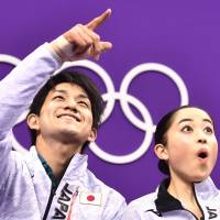 Ryuichi Kihara and Miu Suzaki react after competing in the pair skating short program of the figure skating event during the Pyeongchang 2018 Winter Olympic Games on Feb. 14 How Asia won the rights to host three Olympics in a row