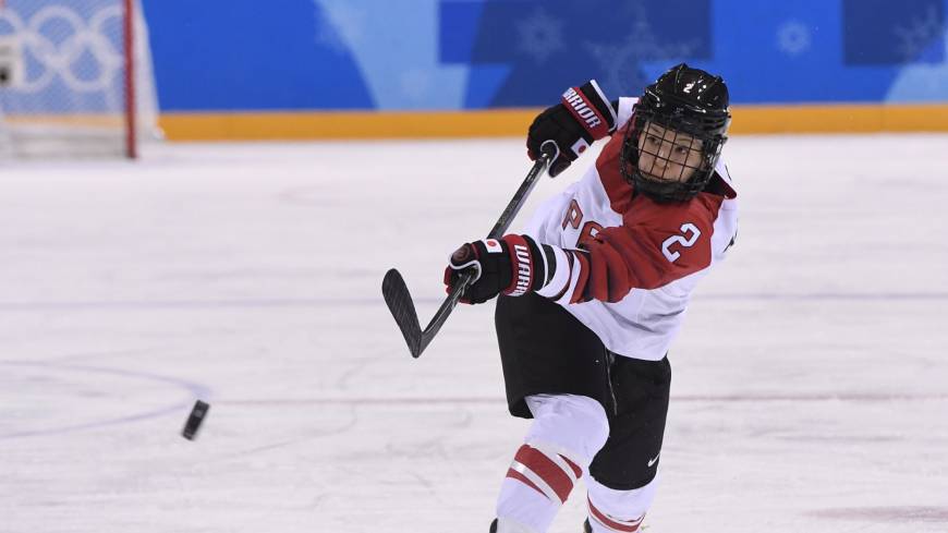Japan’s Shiori Koike shoots the puck during a 5th-8th-place classification game against Switzerland at the Pyeongchang Olympics on Tuesday. Smile Japan must build on progress