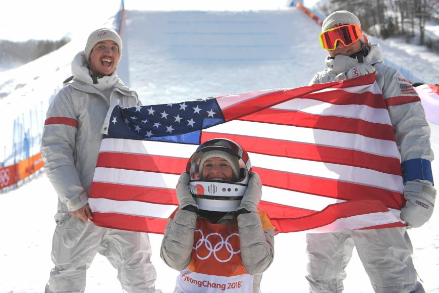 Jamie Anderson (center) celebrates after winning the women