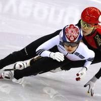 South Korea’s Choi Min-jeong and China’s Fan Kevin race in the women’s 3,000-meter short-track speedskating relay final on Tuesday night at Gangneung Ice Arena. South Korea grabs gold in women's short-track 3,000-meter relay