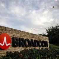 The Broadcom Ltd. logo is seen on a sign at the firm’s headquarters in Irvine, California, in November. With block on Broadcom bid, Trump makes clear U.S. tech interests are 'not for sale'