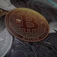 A bitcoin logo is seen at a facility of the Youth and Sports Ministry in Caracas on Feb. 23. Trail of Coincheck's stolen cryptocurrency leads to Canada: researcher