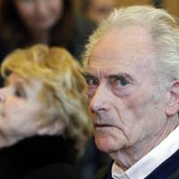 Pierre Le Guennec and his wife, Danielle, wait for the opening of their trial at the courthouse in Grasse, southeastern France, Tuesday. Le Guennec, a retired electrician and former Picasso employee, and his wife are charged with possession of 271 stolen drawings and paintings by the late Spanish artist Pablo Picasso. Sentence overturned for Picasso's electrician, convicted for possession of stolen artwork