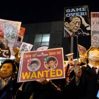 Protesters blast Prime Minister Shinzo Abe during a rally near his office Monday evening, hours after the Finance Ministry admitted to secretly doctoring documents at the center of a cronyism scandal linked to Abe and his wife. As Moritomo scandal reverberates, protesters gather for second day to call on Abe and Taro Aso to resign