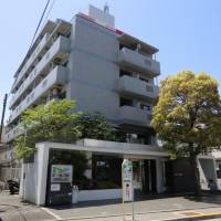 Not knowing thy neighbor: Share houses, like this converted condominium in Adachi Ward, usually comprise individual bedrooms and shared toilet and kitchen facilities, but they often don’t offer communal meeting or living spaces. Doling out some truths about Japan's 'share houses'